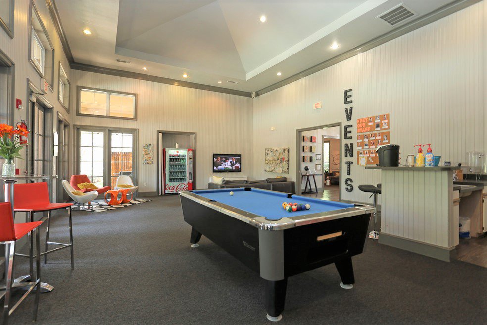 Clubhouse with a pool table, vending machine, gaming lounge, and coffee and cookie bar at the Arbors of Sam Houston